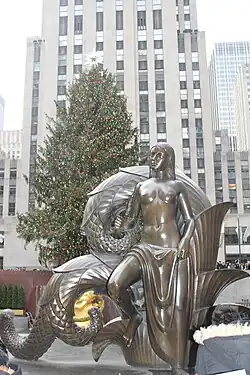 Paul Manship "Maiden" flanks right side of staircase.